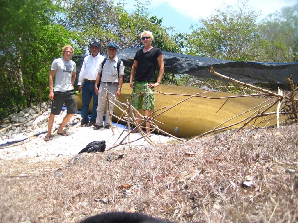 Company staff presenting the elevated water buffer in Indonesia